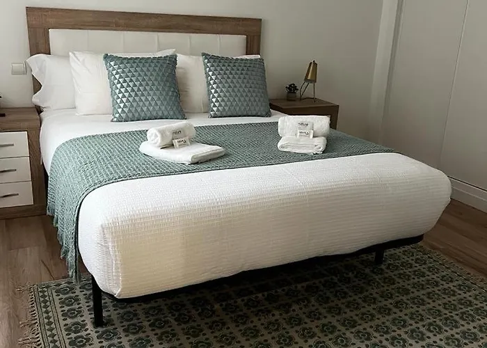 White Con Parking Gratis * 比戈